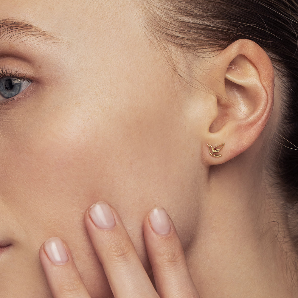 Gold attached bird outline earrings