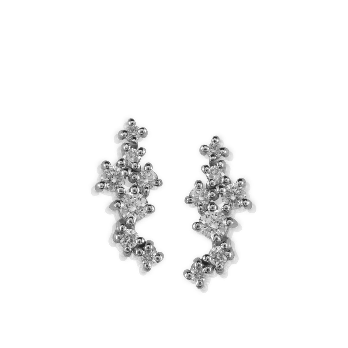 Tight gold earrings studded with diamonds of varying sizes