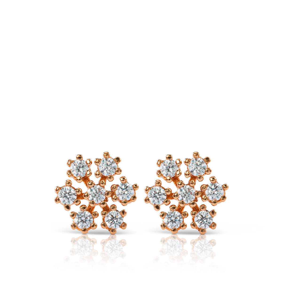 Studded diamond earrings inspired by a snowflake