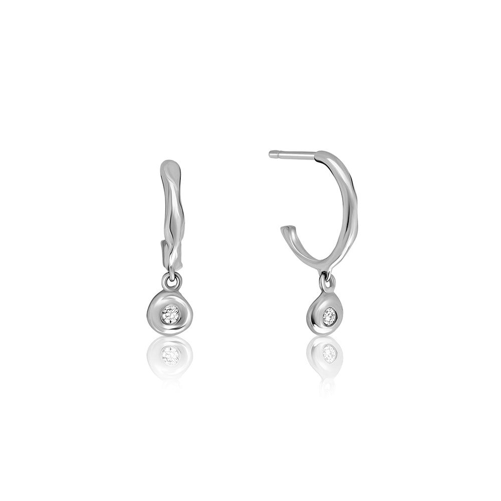 Small gold amorphous hoop earrings with a 4-point diamond pendant in an asymmetrical gold frame