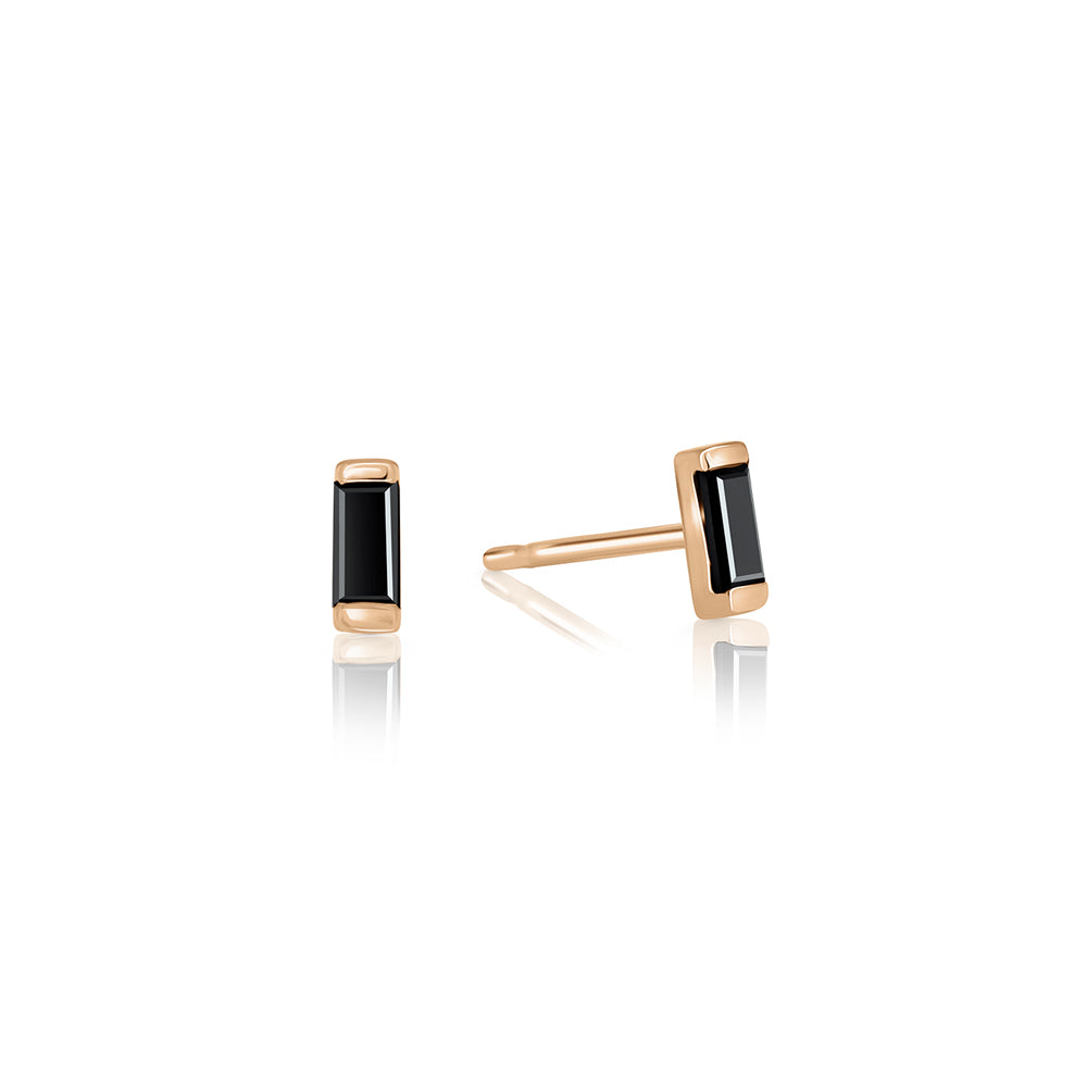 Close-fitting gold earrings inlaid with baguette-cut black diamonds