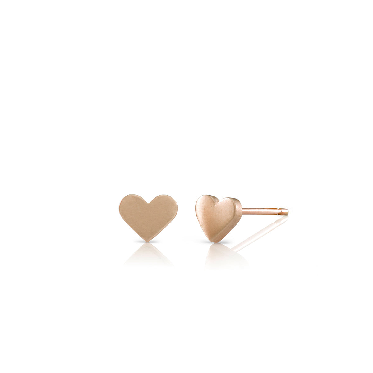 Gold earrings in the shape of a heart