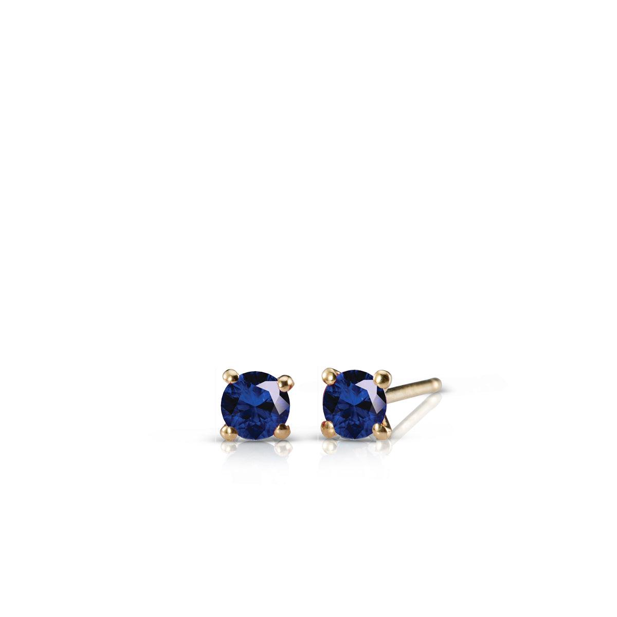 Gold solitaire earrings studded with sapphires
