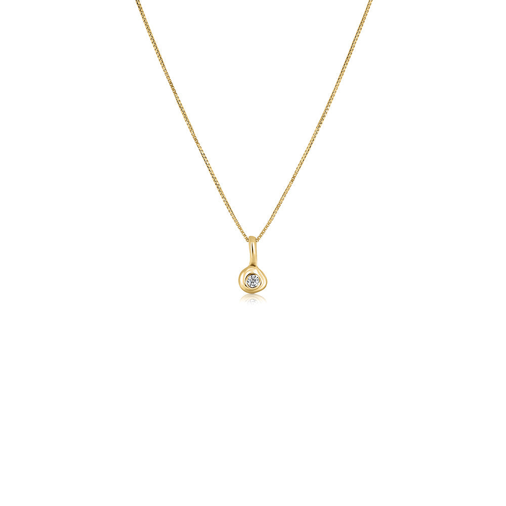 Gold necklace with a small lab diamond pendant, asymmetrical frame