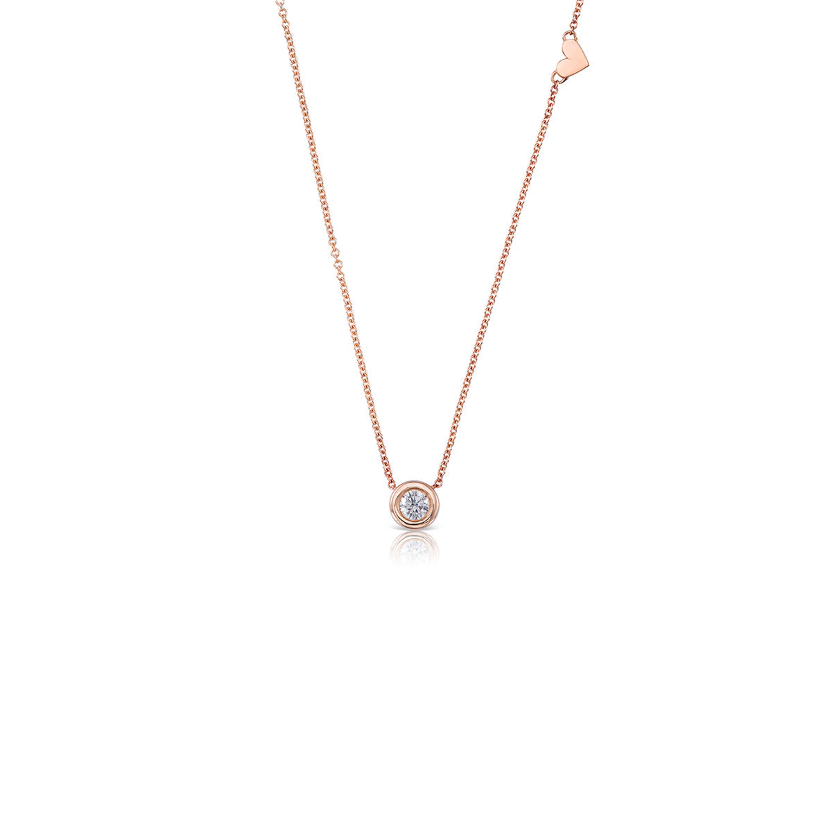 A 30 point lab diamond studded gold chain with a heart pendant on the side