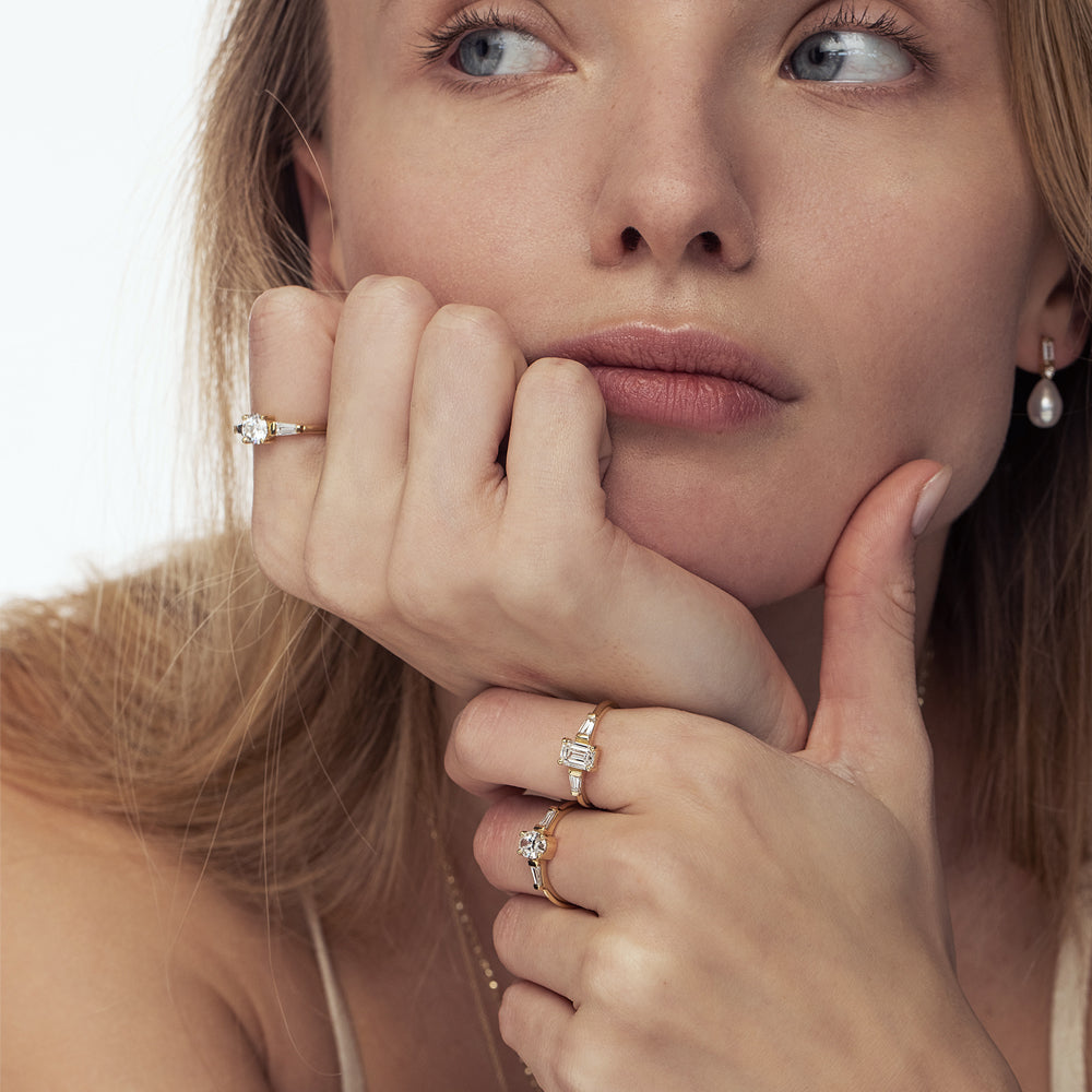 Engagement ring set with laboratory diamonds, emerald cut in an unforgettable design