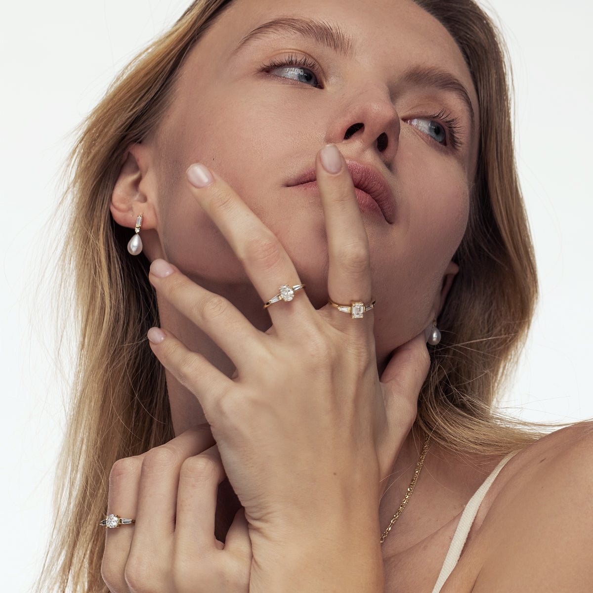 Engagement ring set with laboratory diamonds, emerald cut in an unforgettable design