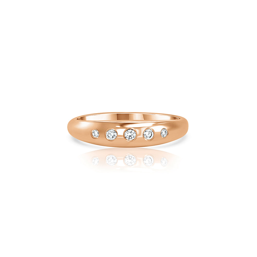 A gold ring set with 5 sunken laboratory diamonds