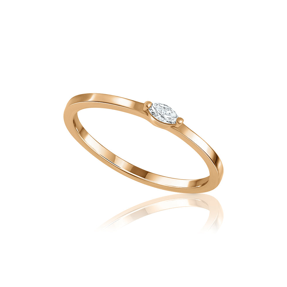 Fine gold ring set with a small marquise-cut lab diamond