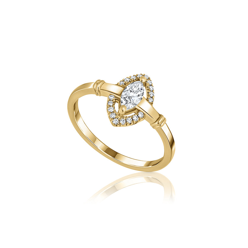 An impressive and rich gold ring set with a central marquise-cut lab diamond and diamond halo