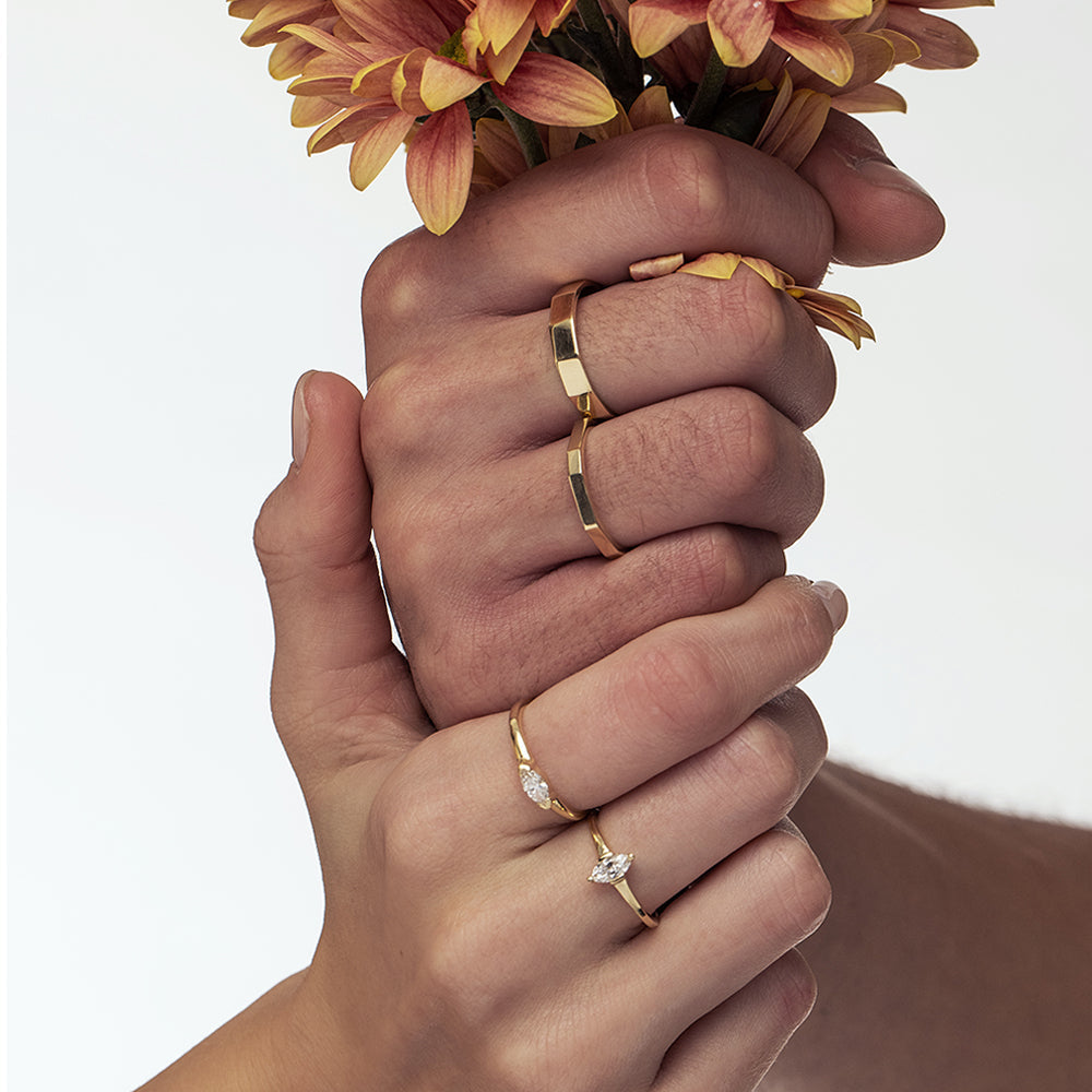 Fine gold ring set with a marquise-cut laboratory diamond