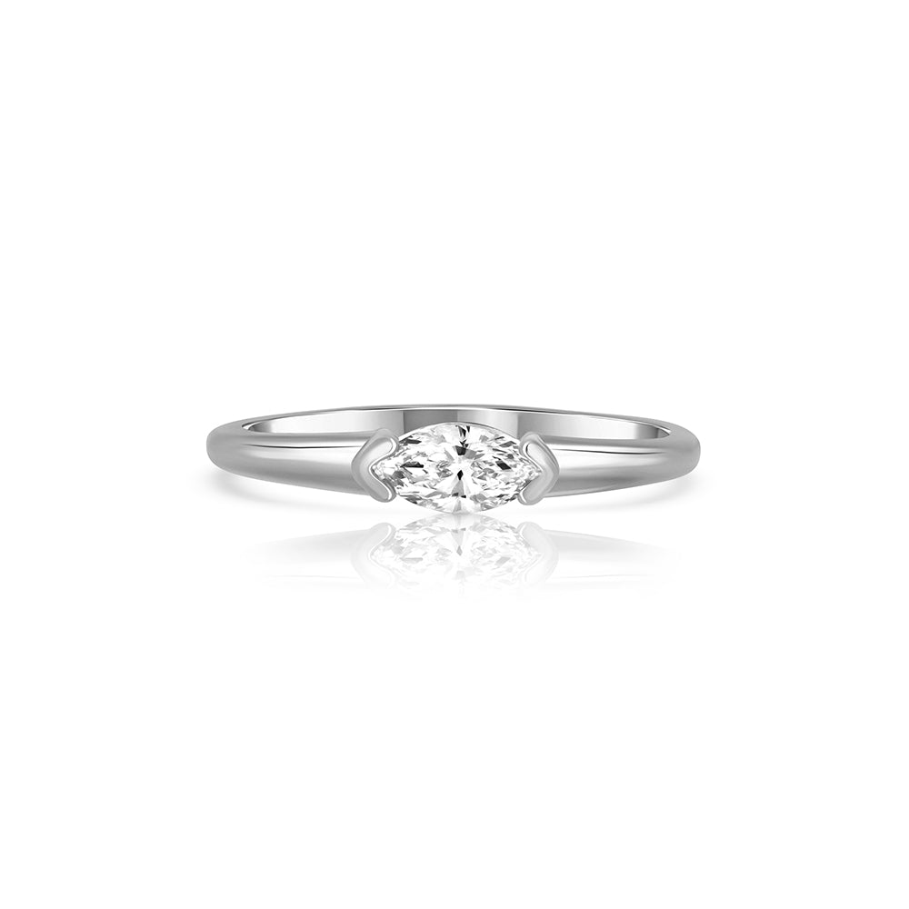 Fine gold ring set with a marquise-cut laboratory diamond