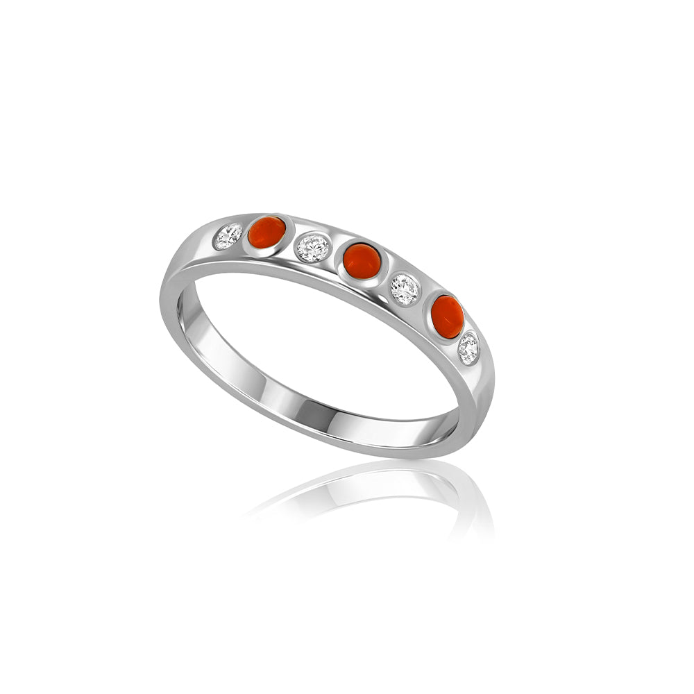 A special gold ring set with natural coral and laboratory diamonds