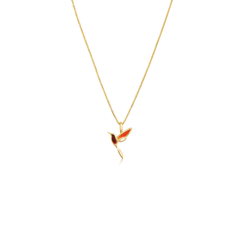 A special gold necklace with an enamel bird pendant