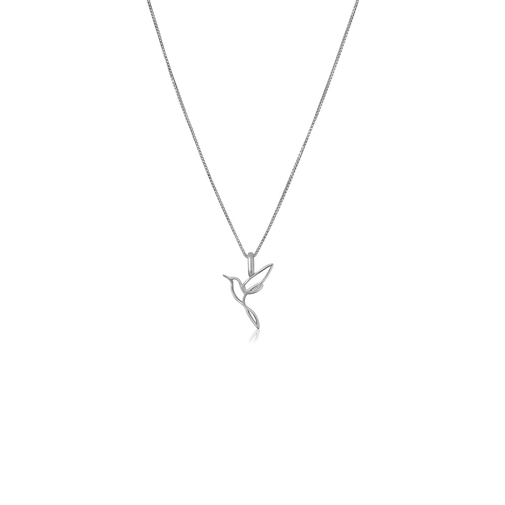 Delicate gold chain with a bird pendant