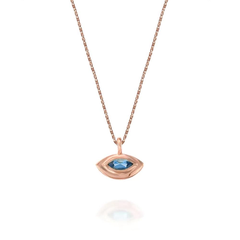 The evil eye pendant with a modern twist in aqua marine inlay