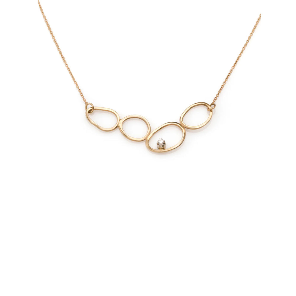A special gold chain designed from 4 amorphous circles and a diamond
