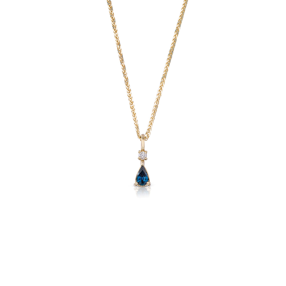 Gold necklace with a drop sapphire and diamond inlaid pendant