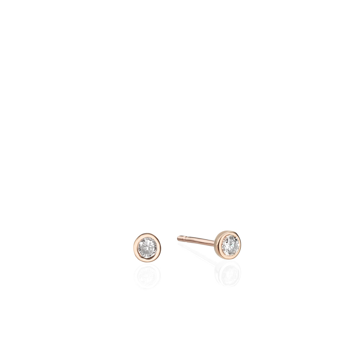 Close-fitting diamond earrings set in a thin gold frame