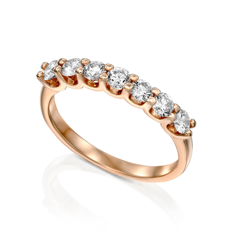 Gold ring with 7 diamonds weighing 10 points per diamond