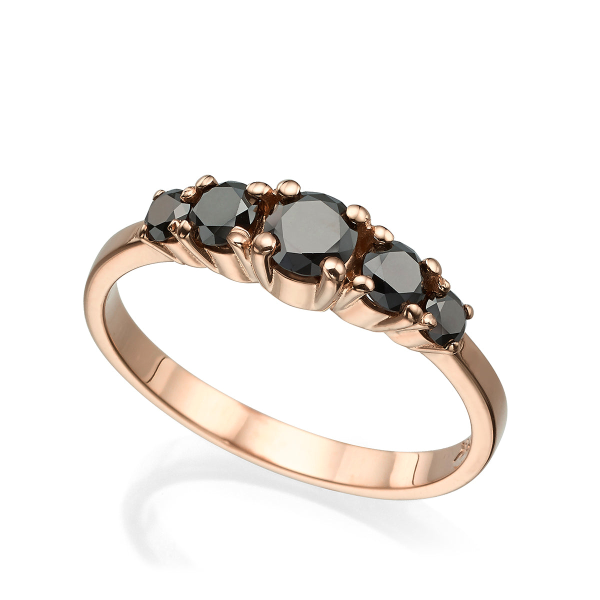 A gold ring set with 5 black diamonds, 80 points, inlaid with teeth