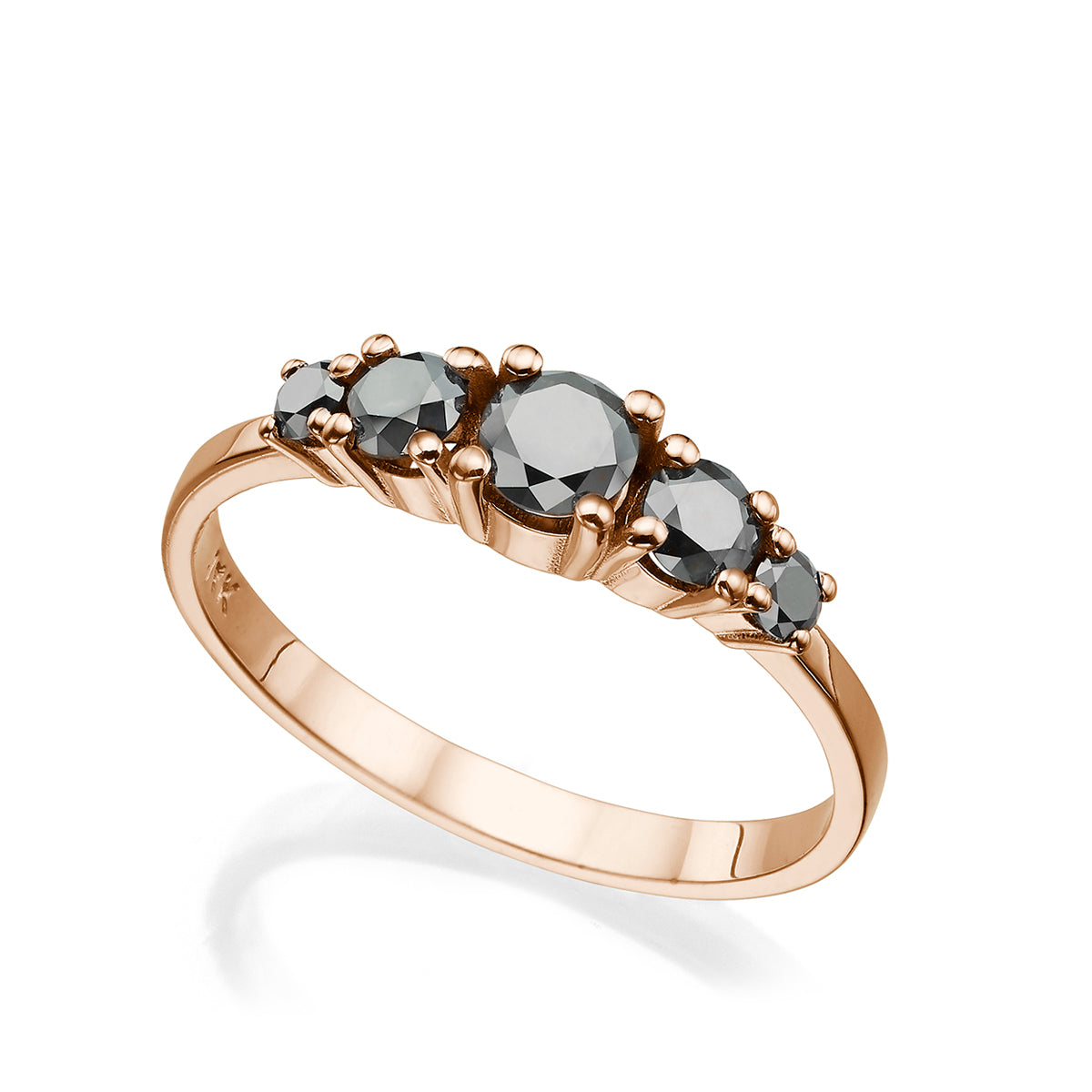 A gold ring set with 5 black diamonds, 60 points, inlaid with teeth