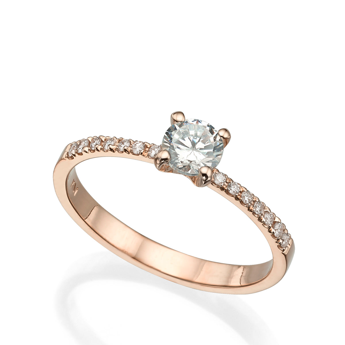 Solitaire gold ring set with a round diamond