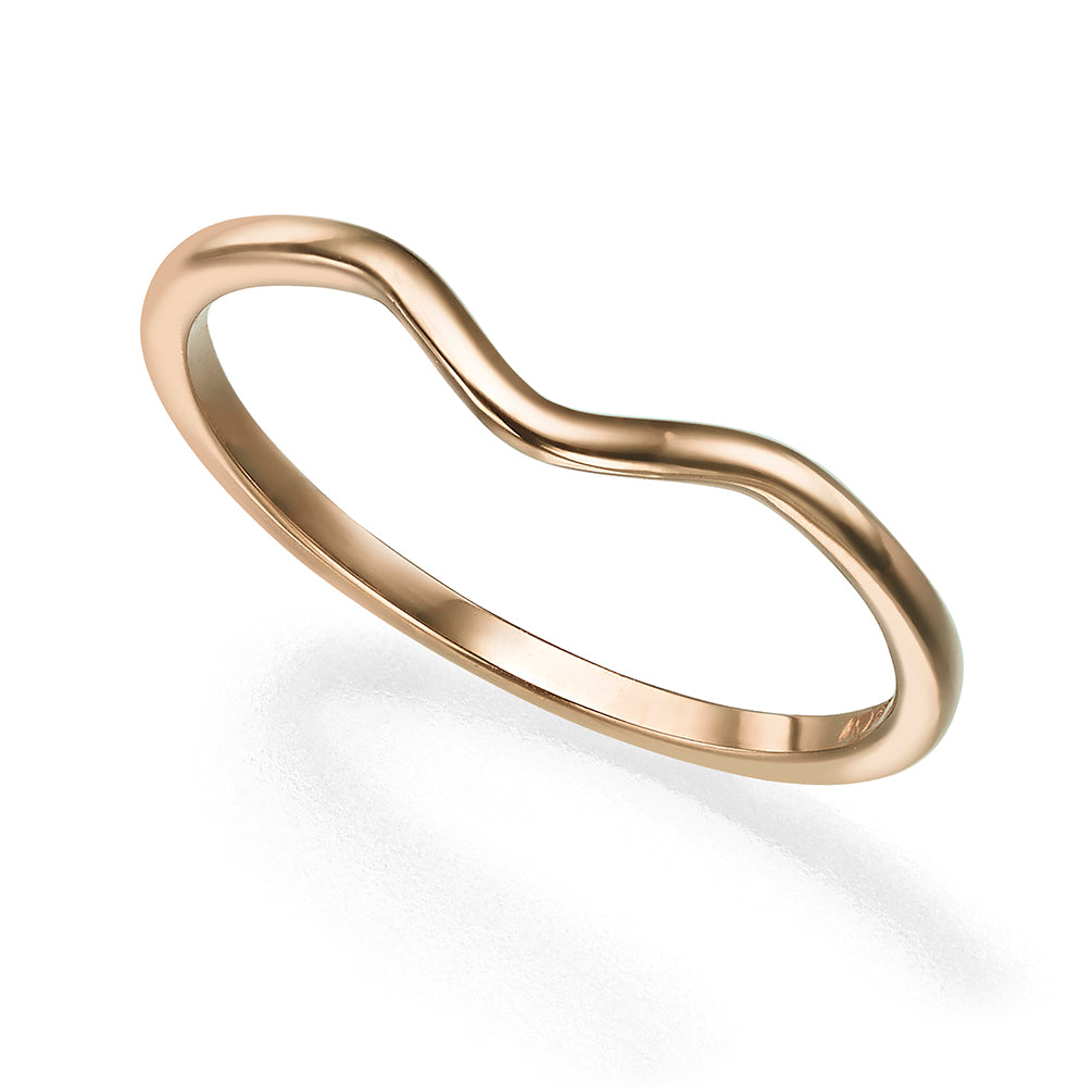 A gold ring with a wave