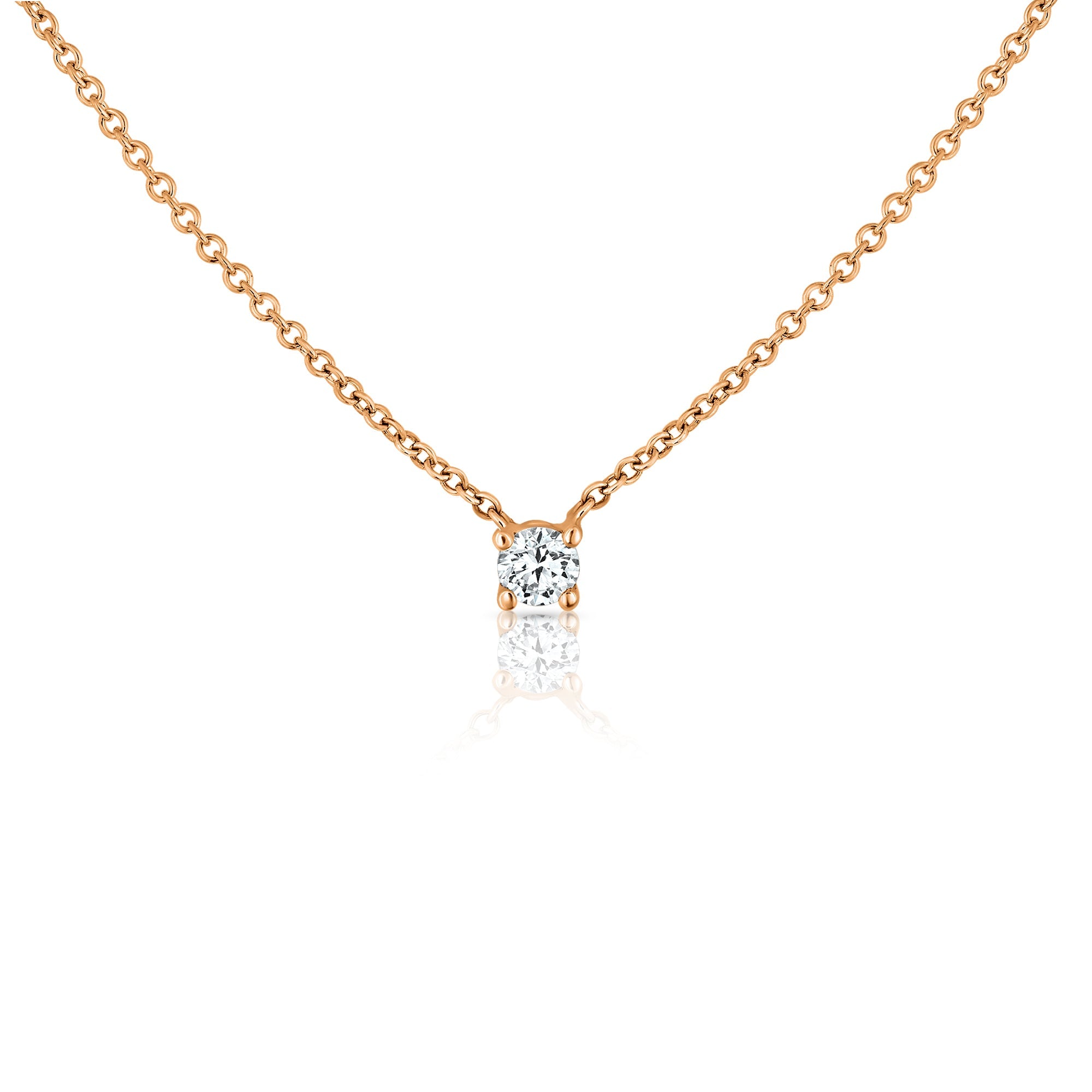 A classic gold chain set with a lab diamond weighing 10 points