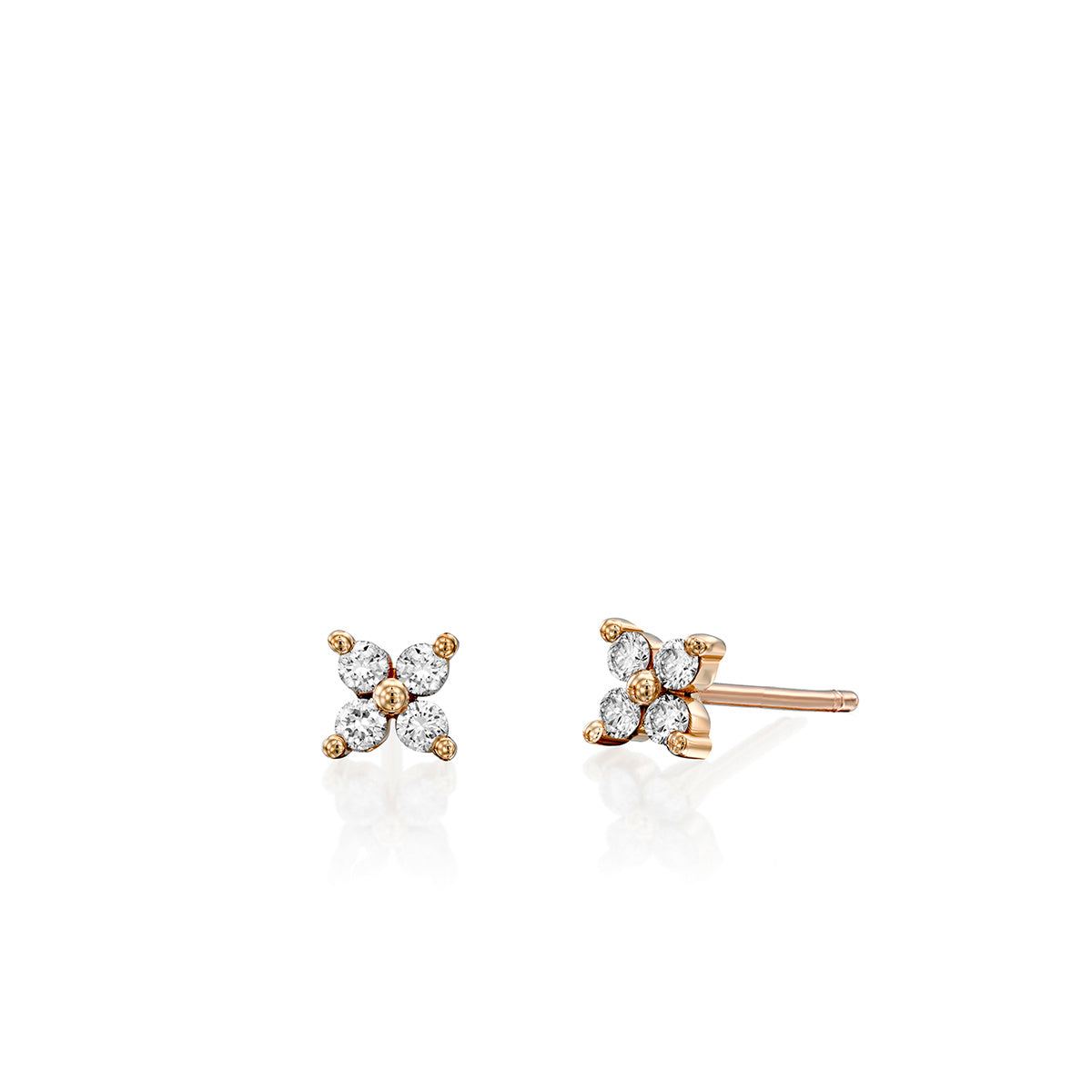 Tight gold earrings set with 4 white diamonds