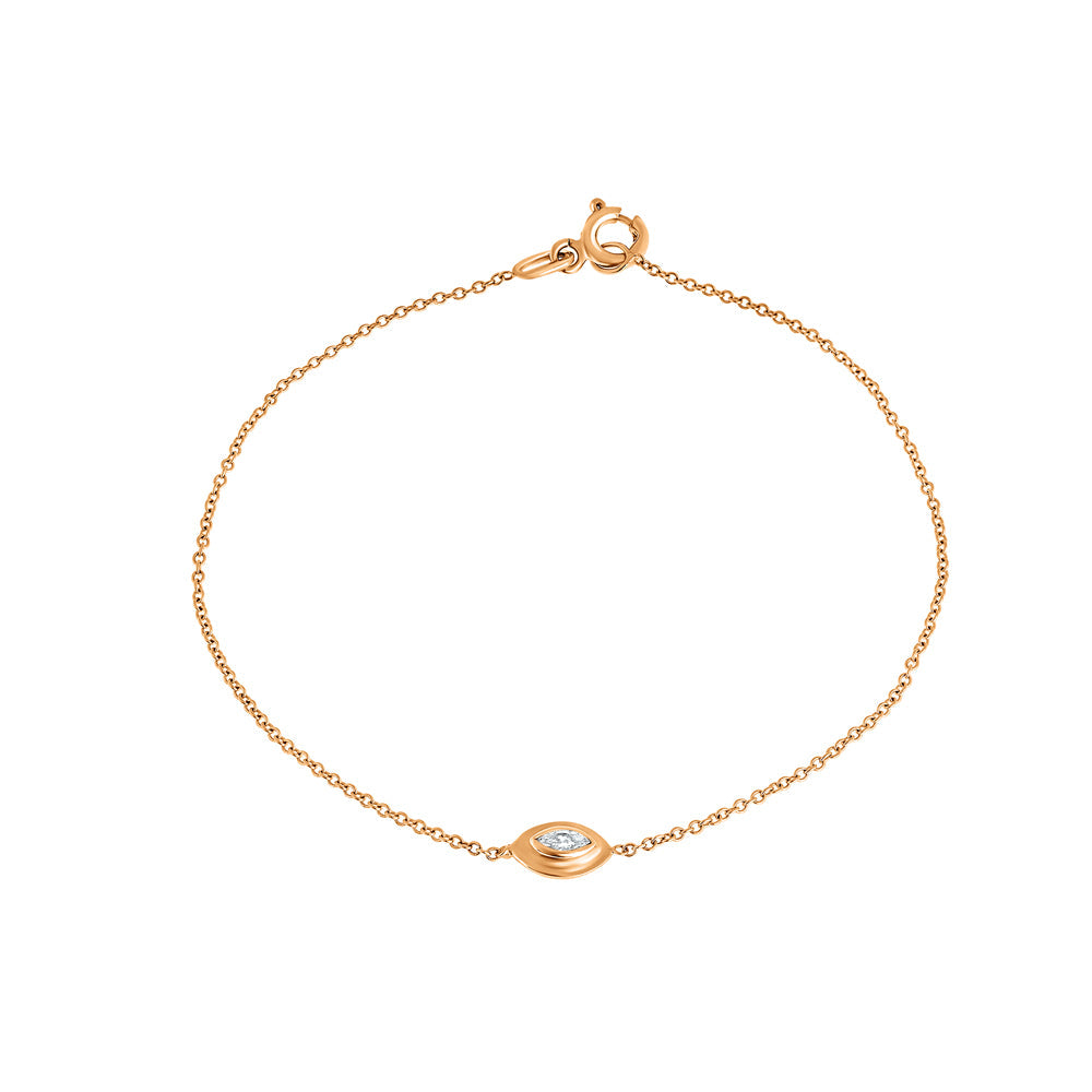 A delicate gold bracelet in the modern Ein Hare style, set with a marquise-cut natural diamond
