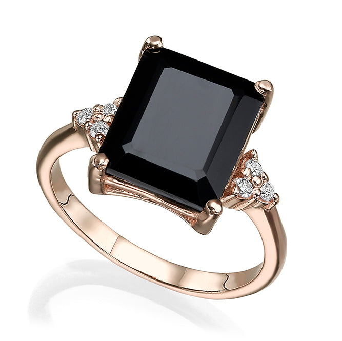 Engagement ring studded with rectangular black onyx and 6 sided diamonds