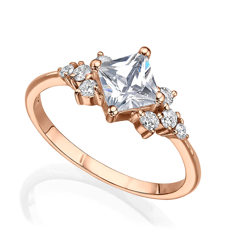 Princess gold ring set with a square lab diamond and round sided diamonds