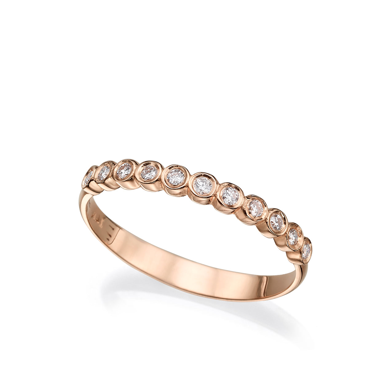 Gold ring with diamonds in cup setting