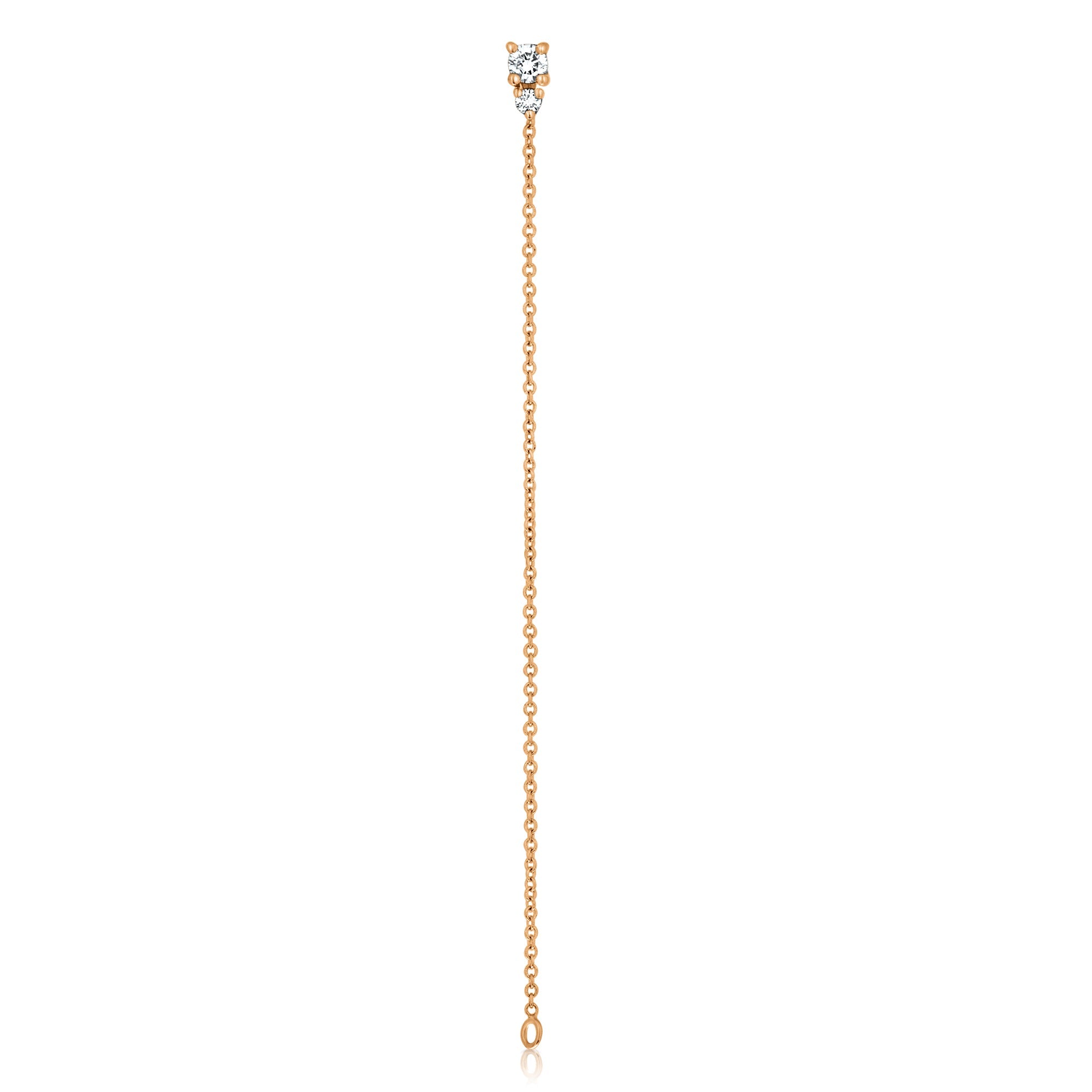 A special gold chain earring studded with laboratory diamonds