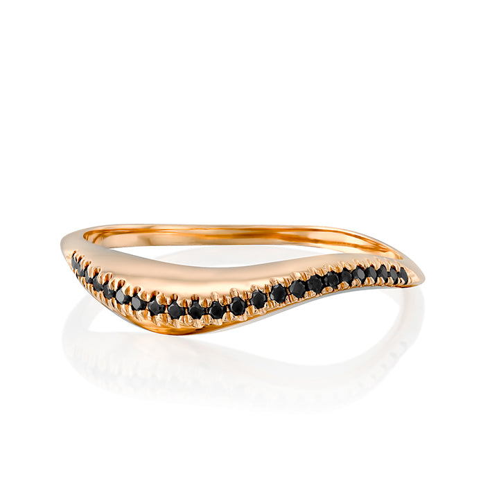 A thick wave ring set with a row of black diamonds