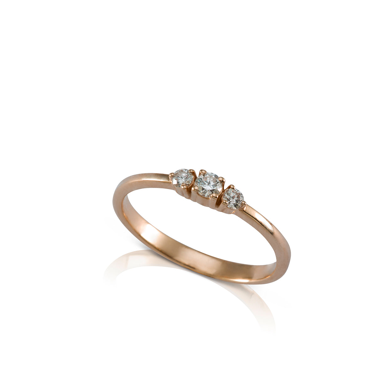 A delicate three diamond ring