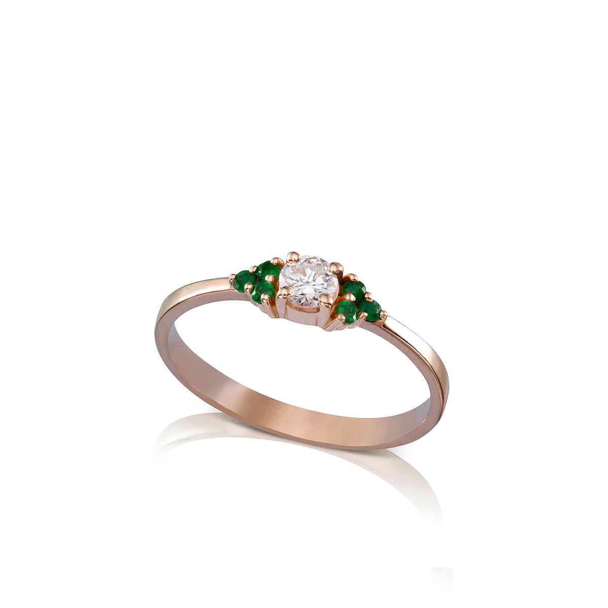 Engagement ring set with a central diamond 0.20ct and 6 emeralds