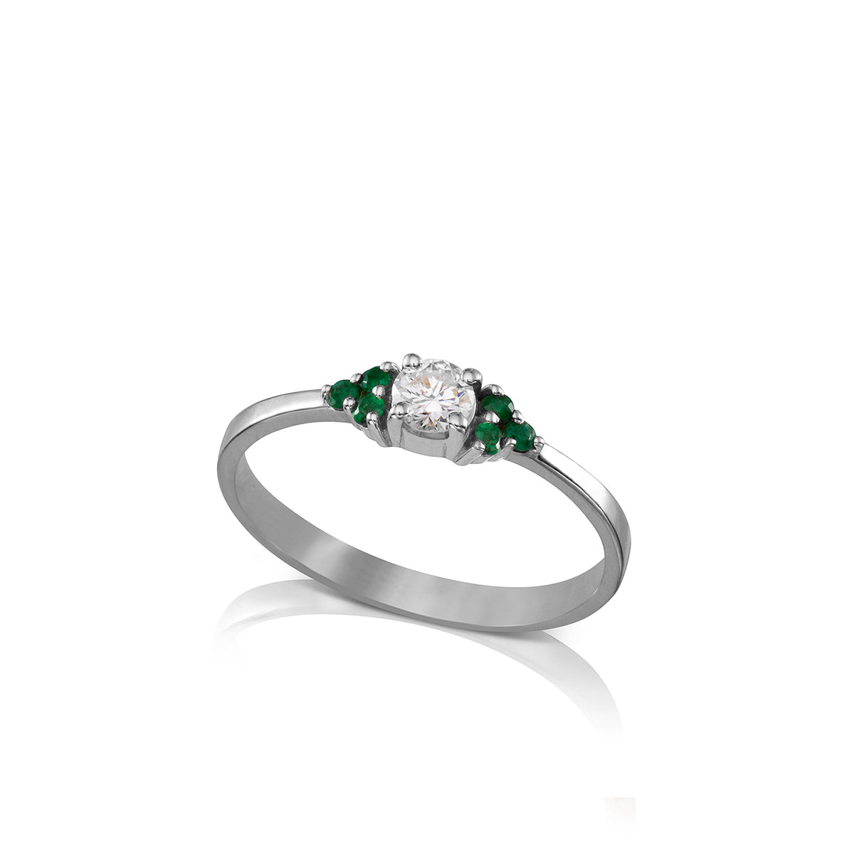 Engagement ring set with a central diamond 0.20ct and 6 emeralds
