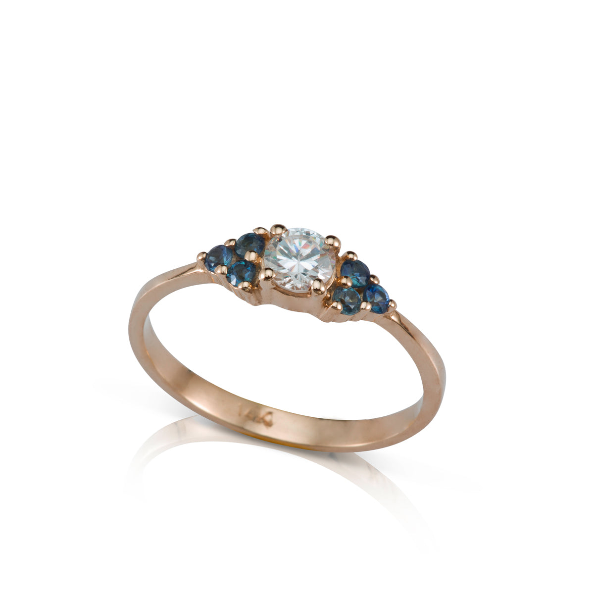 Engagement ring set with a central diamond 0.30ct and 6 sapphires