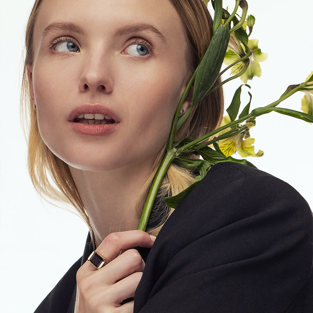 An impressive emerald cut garnet ring