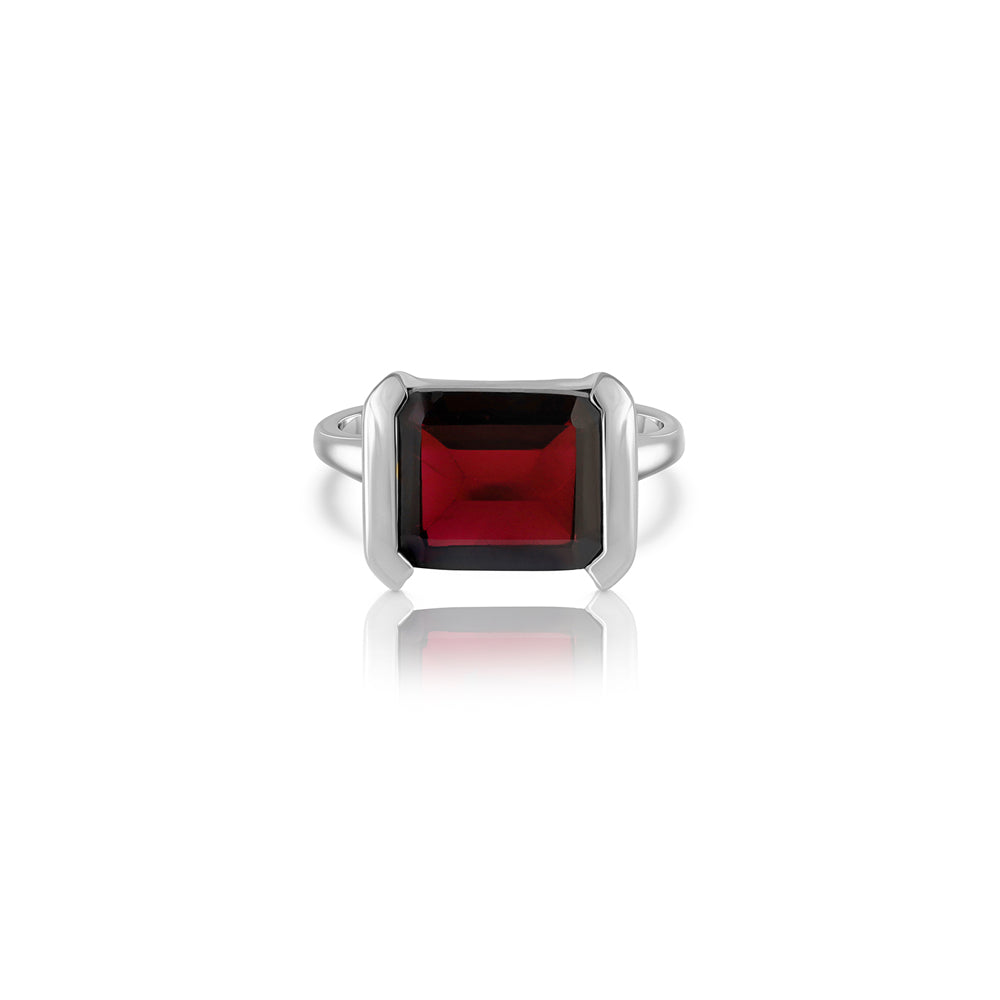 An impressive emerald cut garnet ring