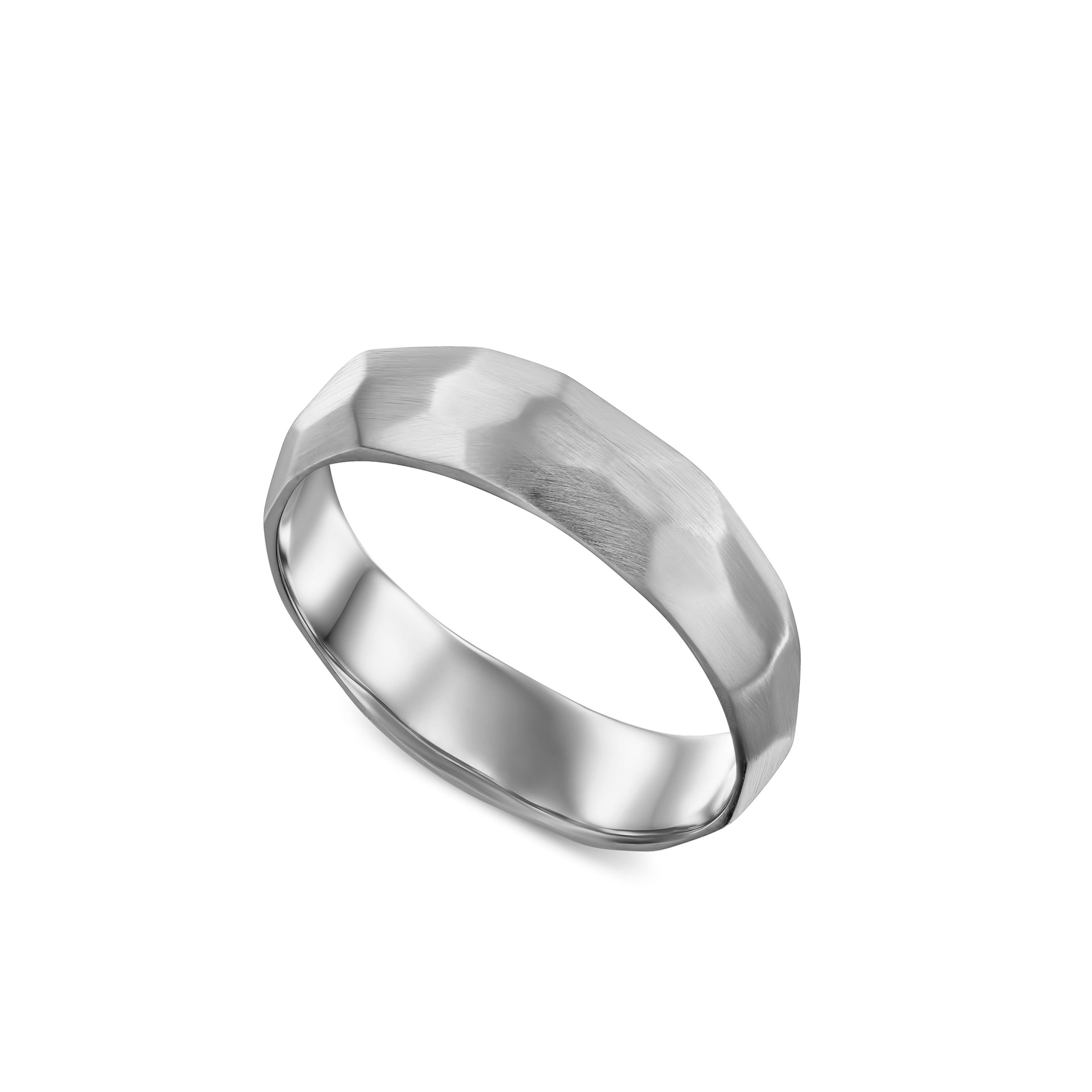 An asymmetrical handmade wedding ring in an original design