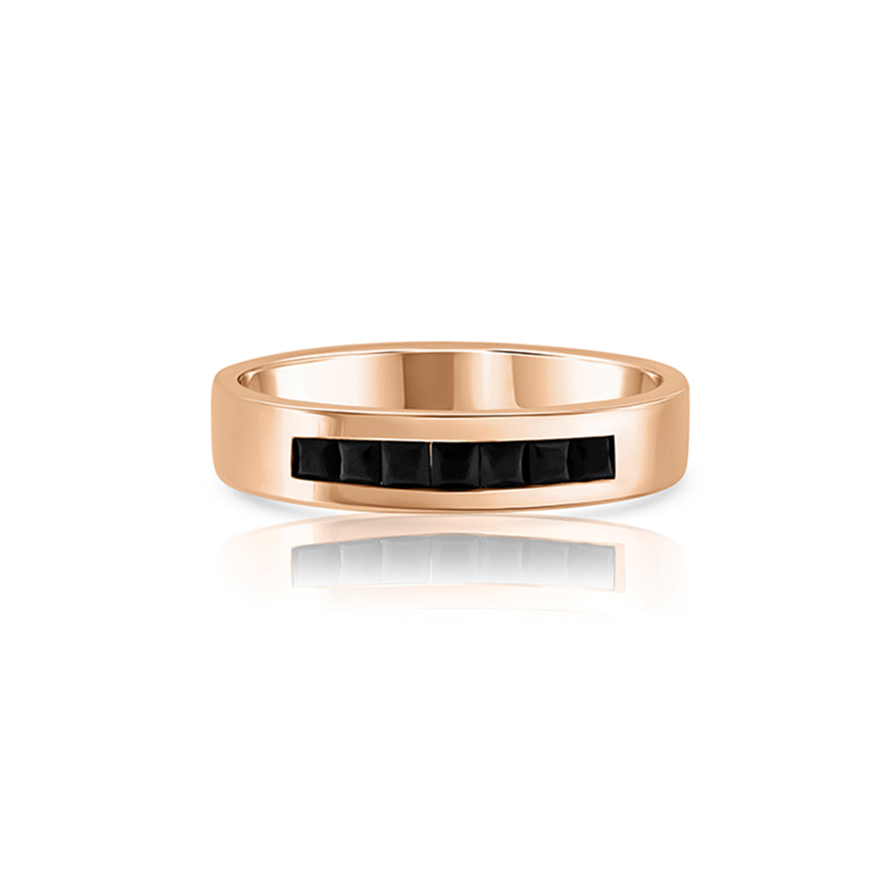 A wide gold ring for men inlaid with onyx in a line princess cut