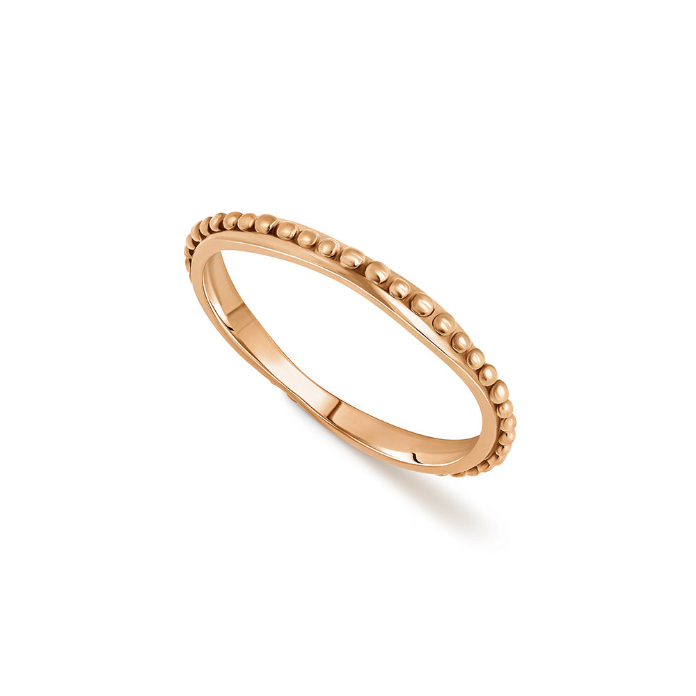 Asymmetric wedding ring decorated with a gold ball