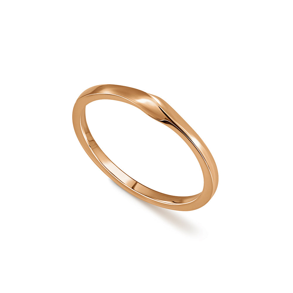 A thin wedding ring with a twist in the front part