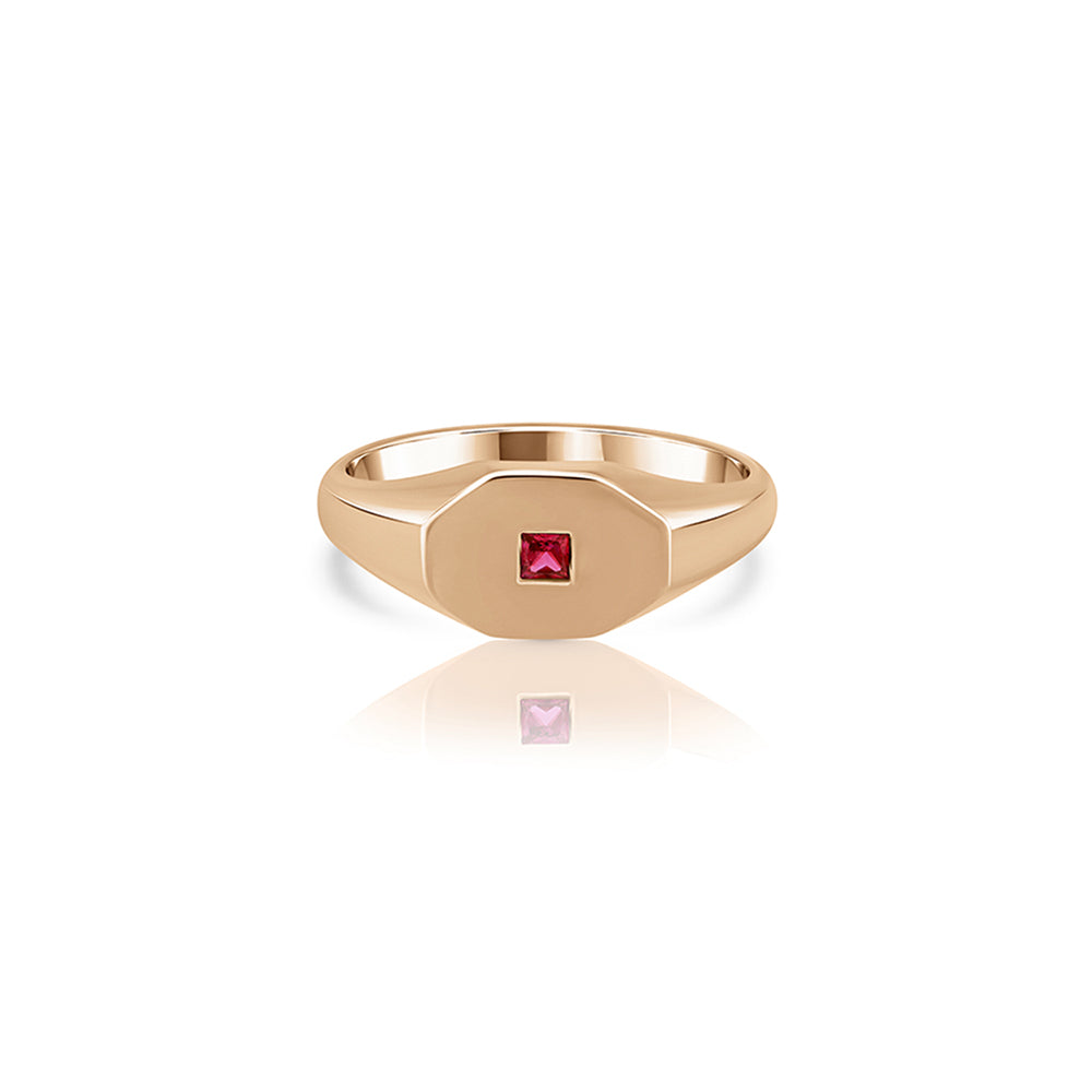 An octagon-shaped signet ring for men, set with princess-cut rubies