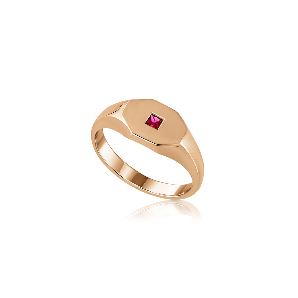 An octagon-shaped signet ring for men, set with princess-cut rubies