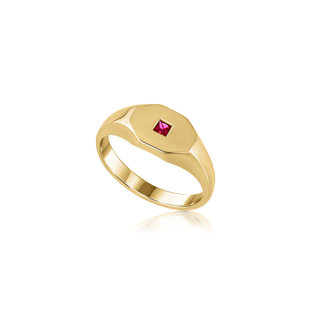 An octagon-shaped signet ring for men, set with princess-cut rubies