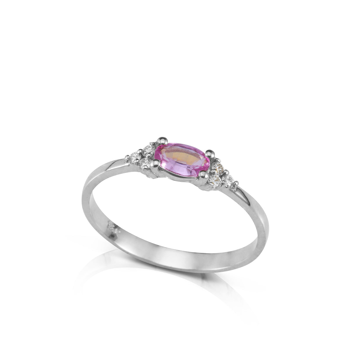 An engagement ring set with a pink sapphire in an oval shape and 6 sided diamonds
